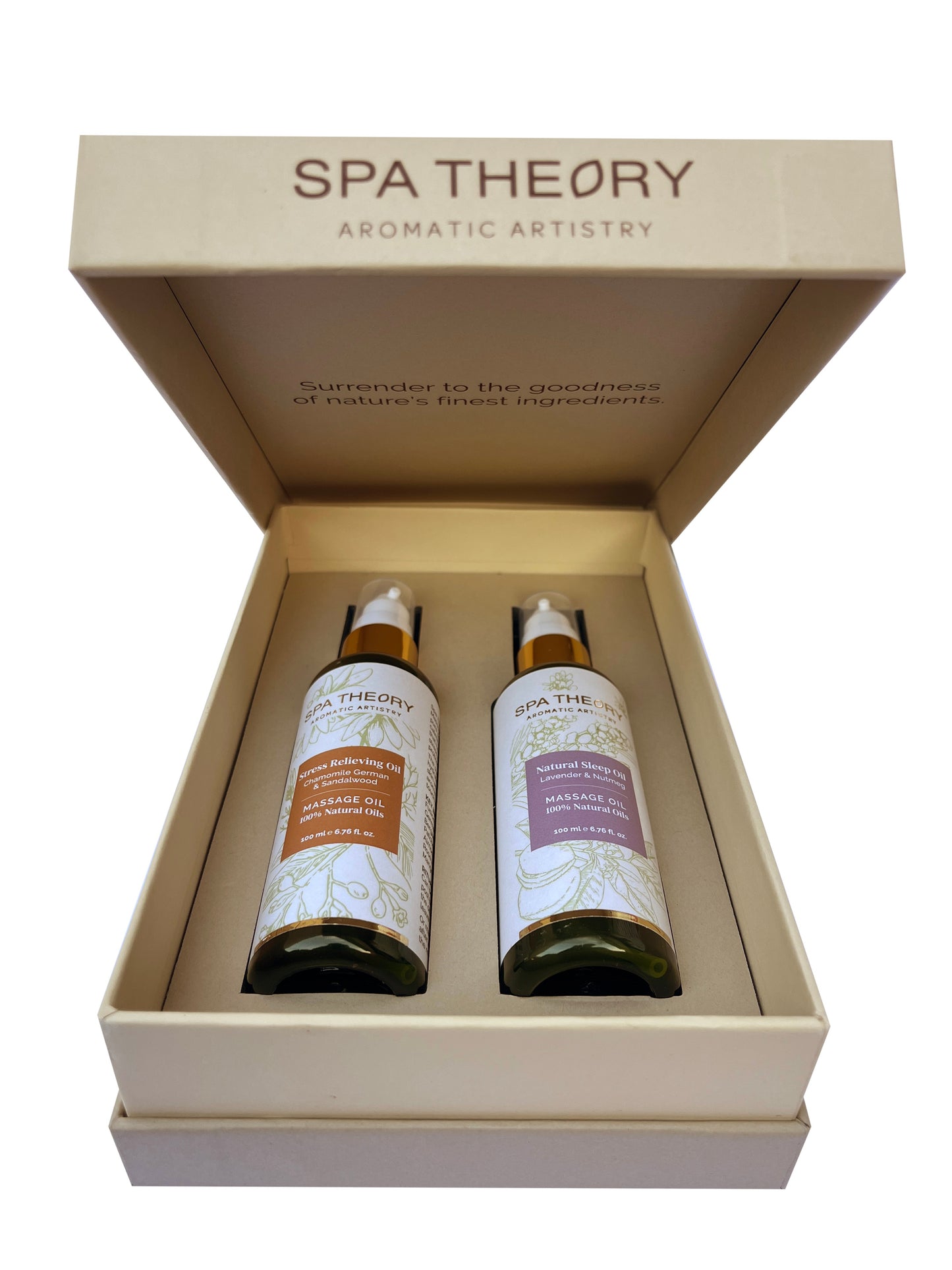 Open beige box displaying two bottles of Spa Theory massage oils. The labels are earthy tones, set in a serene, luxurious presentation