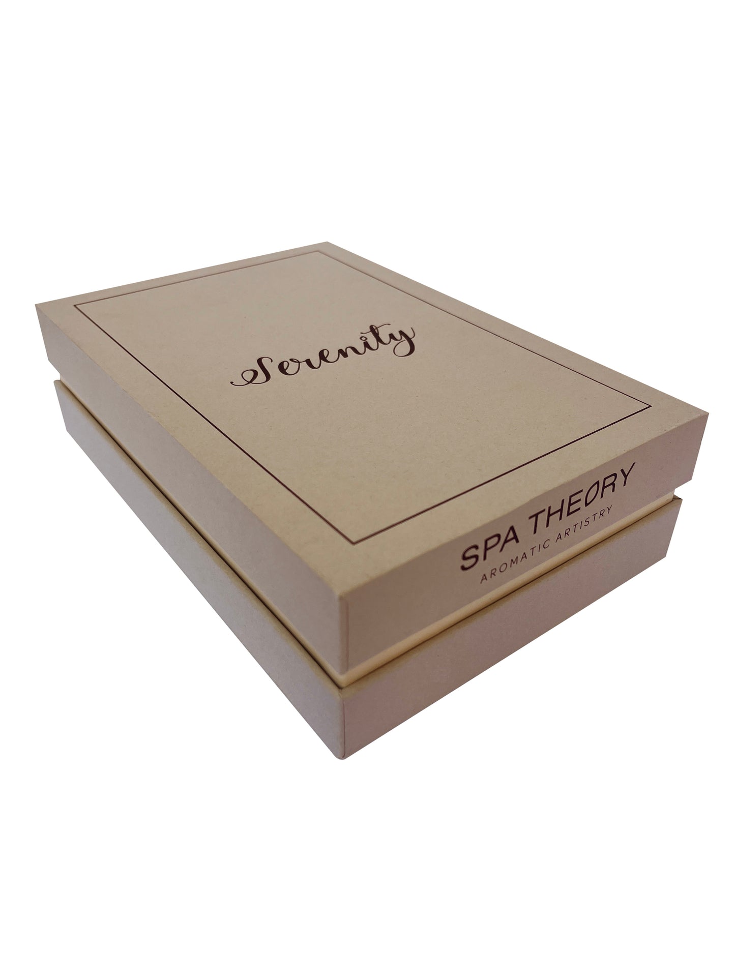 A beige box with "Serenity" elegantly scripted on the lid, alongside the brand "Spa Theory" and "Aromatic Artistry" on the side