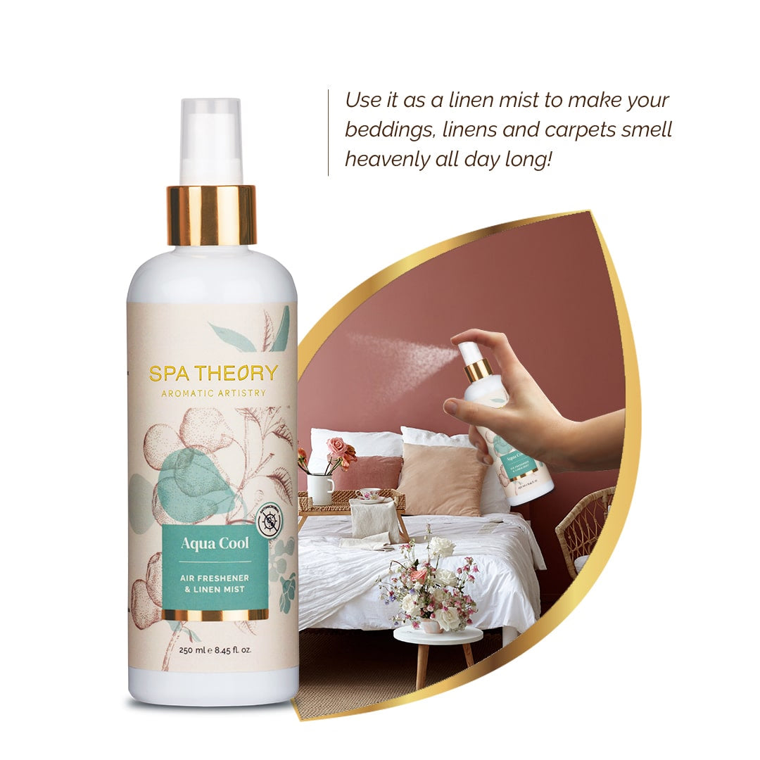 Bottle of Spa Theory Aqua Cool linen mist next to a hand spraying a similar bottle over a cozy bed
