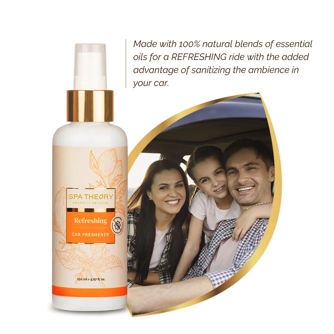 Bottle of Spa Theory "Refreshing" car freshener with orange and floral design