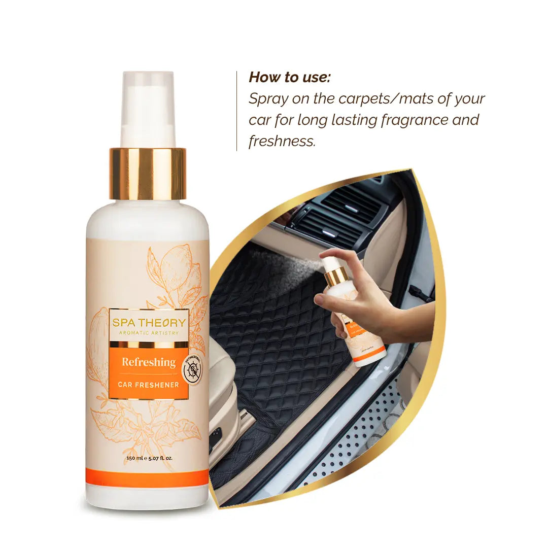 Bottle of "Spa Theory Refreshing Car Freshener" with gold cap. Inset shows a hand spraying it on a car mat