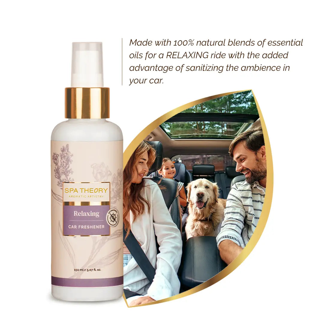 "SPA THEORY Relaxing Car Freshener bottle with lavender design next to a hand spraying it on a car mat