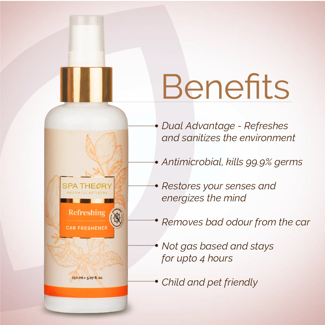 A white bottle of "Spa Theory Aromatic Artistry Refreshing Car Freshener" with gold accents is shown